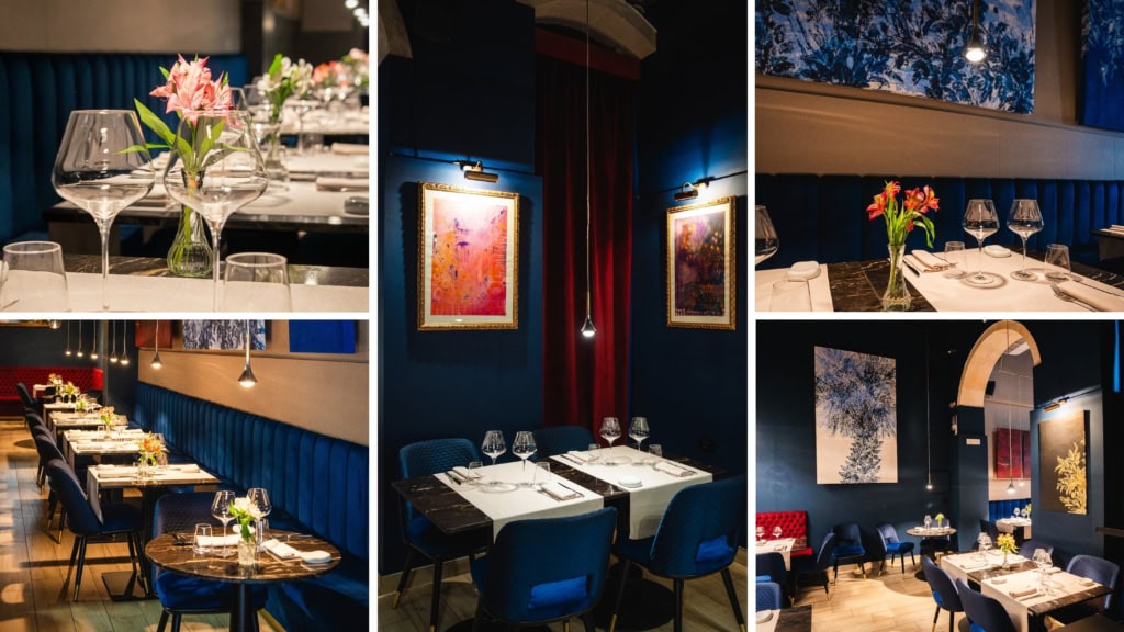 Flûtes à vin et bouquet de fleurs roses en décoration de restaurant sophistiqué Sicile mon amour.